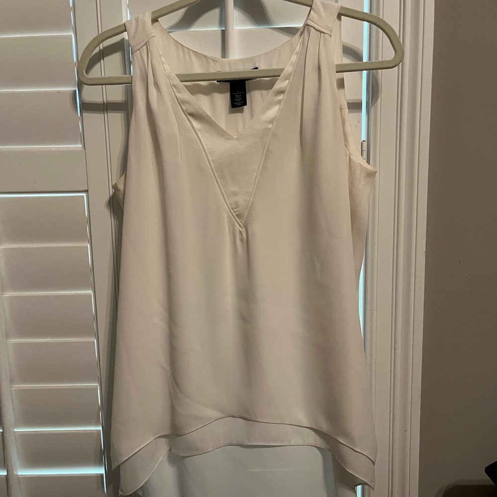 White House Black Market sleeveless blouse. Size small, cream/white